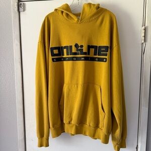 Online Ceramics Yellow Reading Logo Hoodie